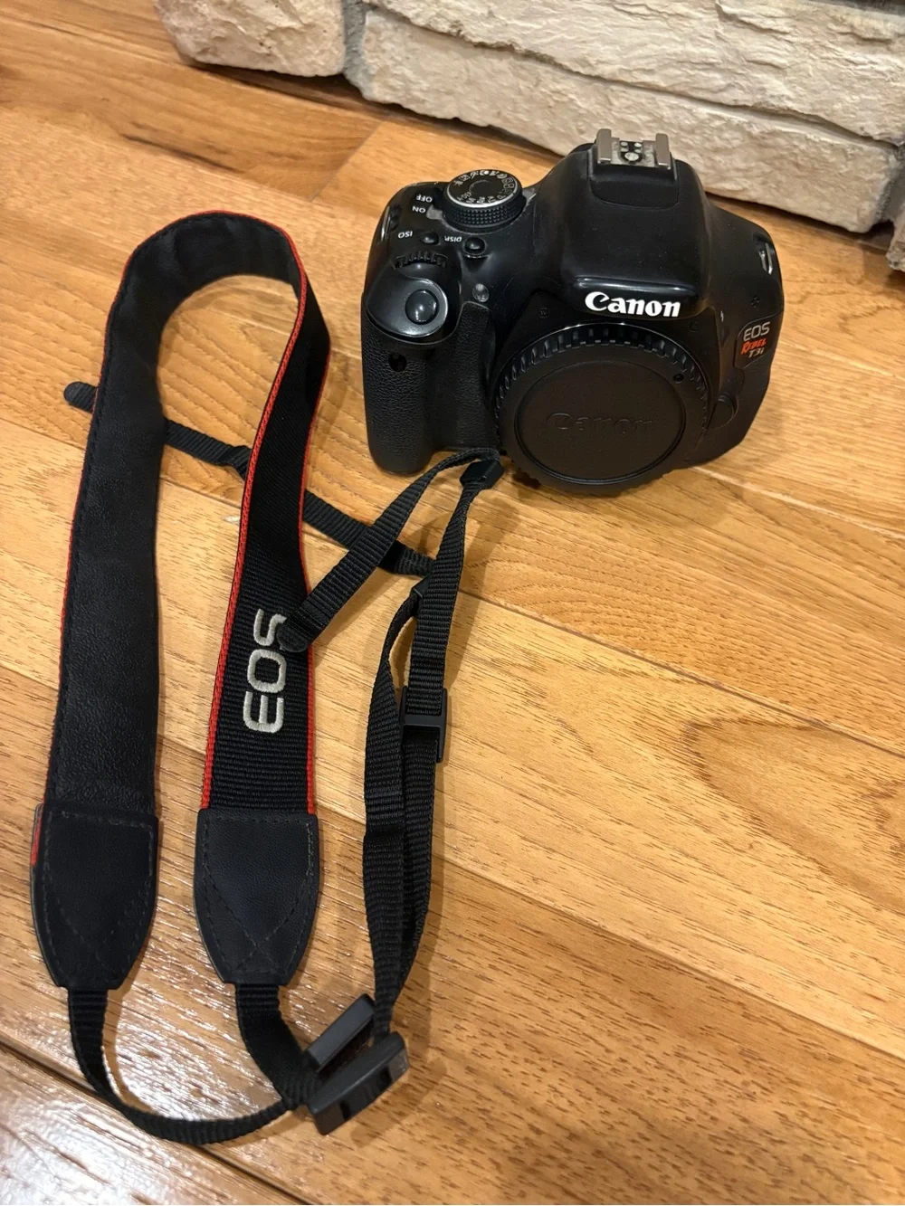 Canon DSLR Camera Body in Black with Black Strap and Red Trim